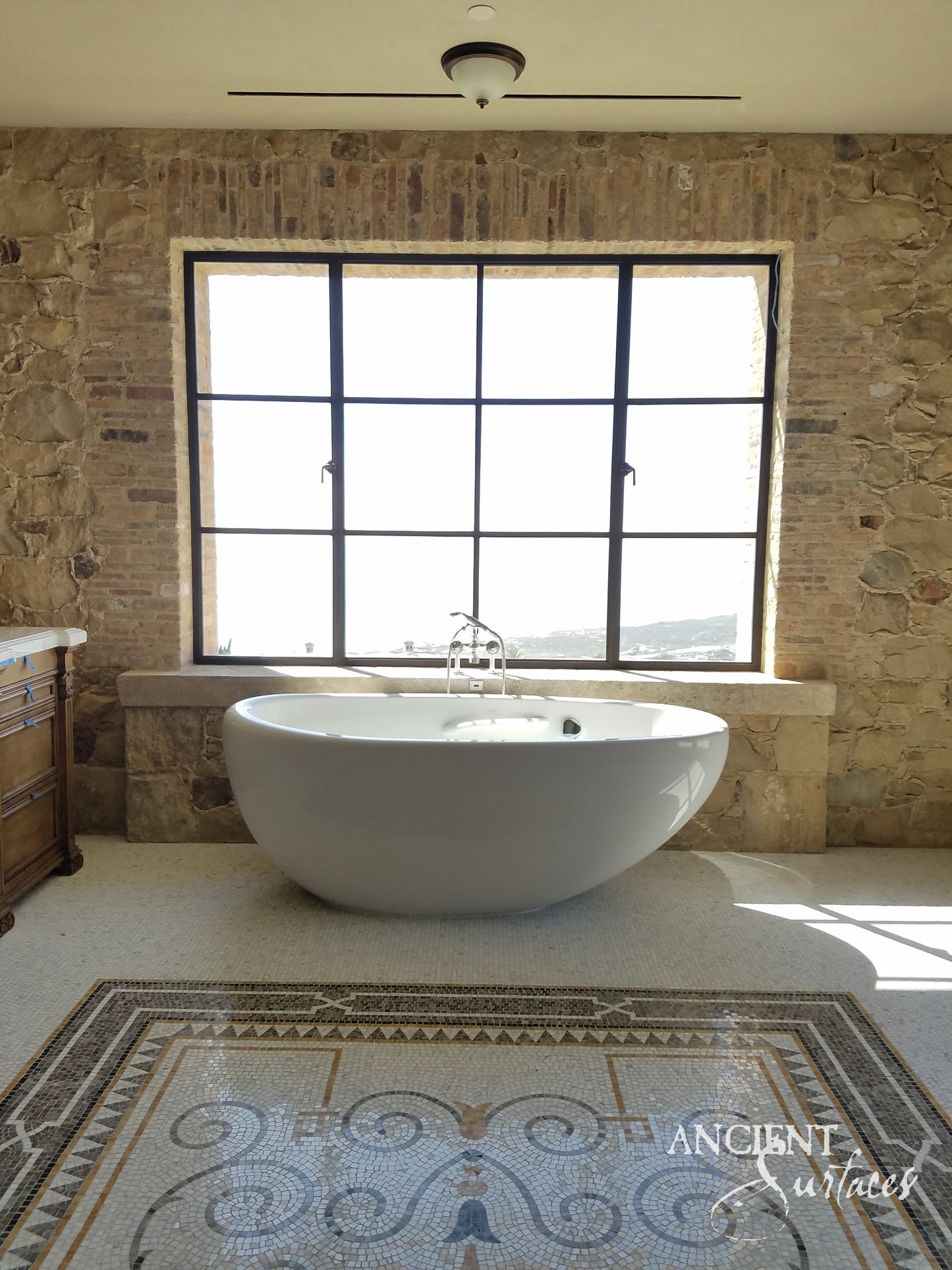 reclaimed_antique_stone_tub_marble_limestone_freestanding_bathtub_hand_carved_soaking_tub_luxury_bath_ancient_surfaces_historic_stonebath_sculpted_stone_tub_custom_carved_marble_bathtub_reclaimed_limestone_tub_old_world_bath_design_classic_european_stone_tub_high_end_bathroom_feature_luxury_interior_design_artisanal_stonework_antique_marble_tub_natural_stone_bath_vintage_stone_bathtub_master_bath_suite_ancient_surfaces_collection