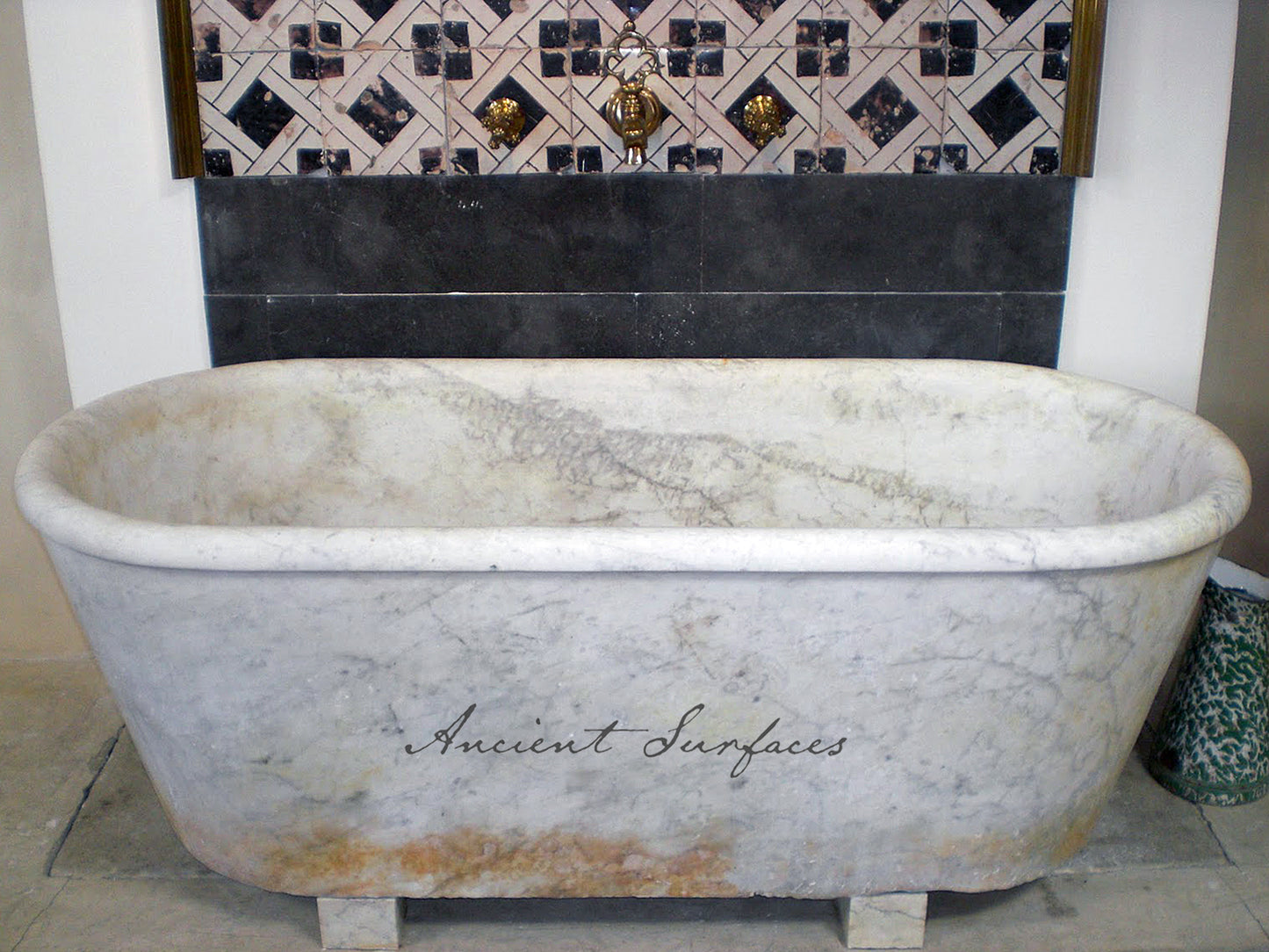 reclaimed_antique_stone_tub_marble_limestone_freestanding_bathtub_hand_carved_soaking_tub_luxury_bath_ancient_surfaces_historic_stonebath_sculpted_stone_tub_custom_carved_marble_bathtub_reclaimed_limestone_tub_old_world_bath_design_classic_european_stone_tub_high_end_bathroom_feature_luxury_interior_design_artisanal_stonework_antique_marble_tub_natural_stone_bath_vintage_stone_bathtub_master_bath_suite_ancient_surfaces_collection