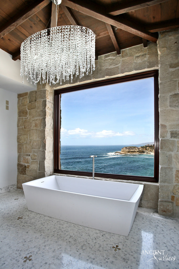 reclaimed_antique_stone_tub_marble_limestone_freestanding_bathtub_hand_carved_soaking_tub_luxury_bath_ancient_surfaces_historic_stonebath_sculpted_stone_tub_custom_carved_marble_bathtub_reclaimed_limestone_tub_old_world_bath_design_classic_european_stone_tub_high_end_bathroom_feature_luxury_interior_design_artisanal_stonework_antique_marble_tub_natural_stone_bath_vintage_stone_bathtub_master_bath_suite_ancient_surfaces_collection