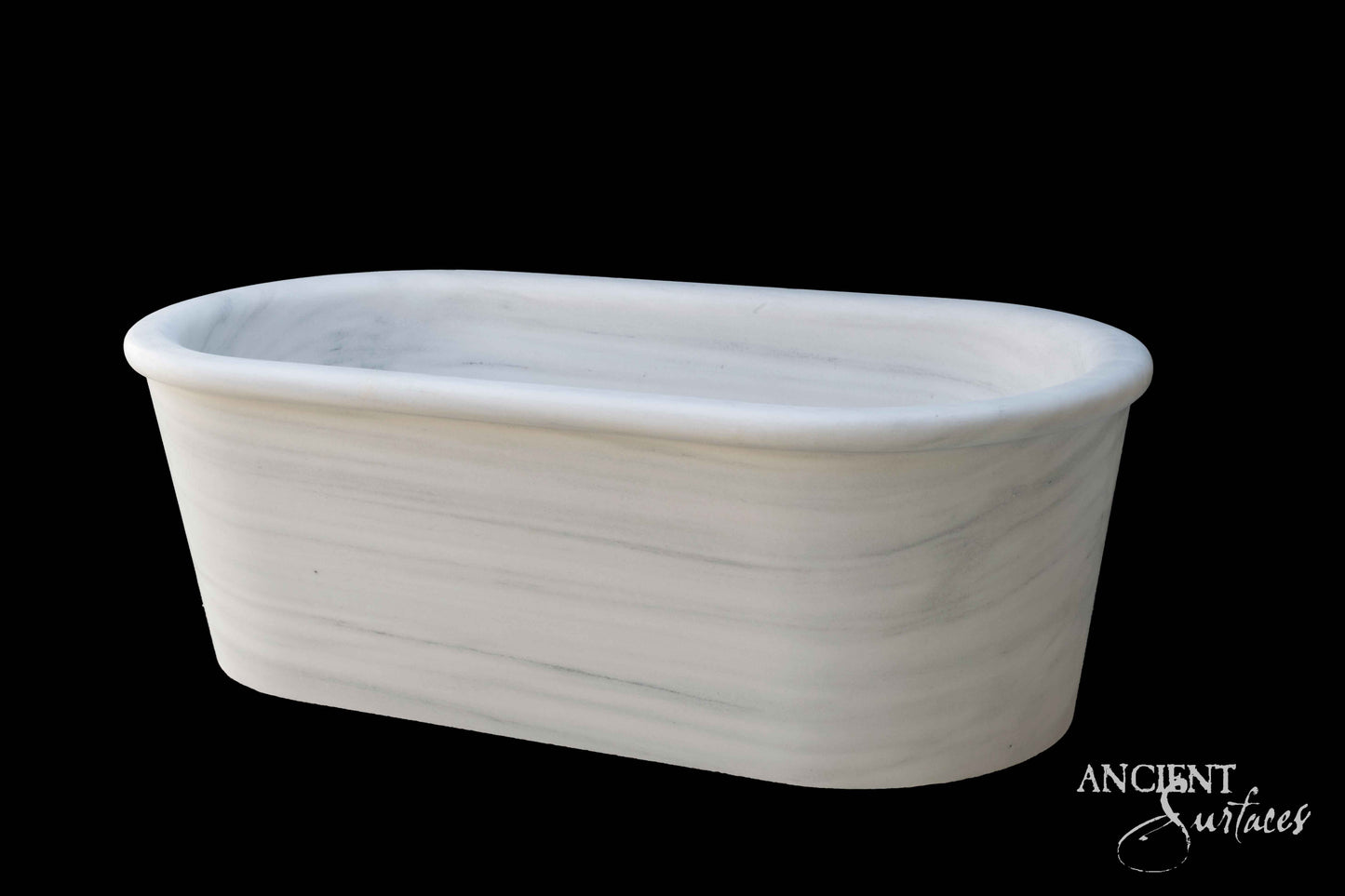 reclaimed_antique_stone_tub_marble_limestone_freestanding_bathtub_hand_carved_soaking_tub_luxury_bath_ancient_surfaces_historic_stonebath_sculpted_stone_tub_custom_carved_marble_bathtub_reclaimed_limestone_tub_old_world_bath_design_classic_european_stone_tub_high_end_bathroom_feature_luxury_interior_design_artisanal_stonework_antique_marble_tub_natural_stone_bath_vintage_stone_bathtub_master_bath_suite_ancient_surfaces_collection