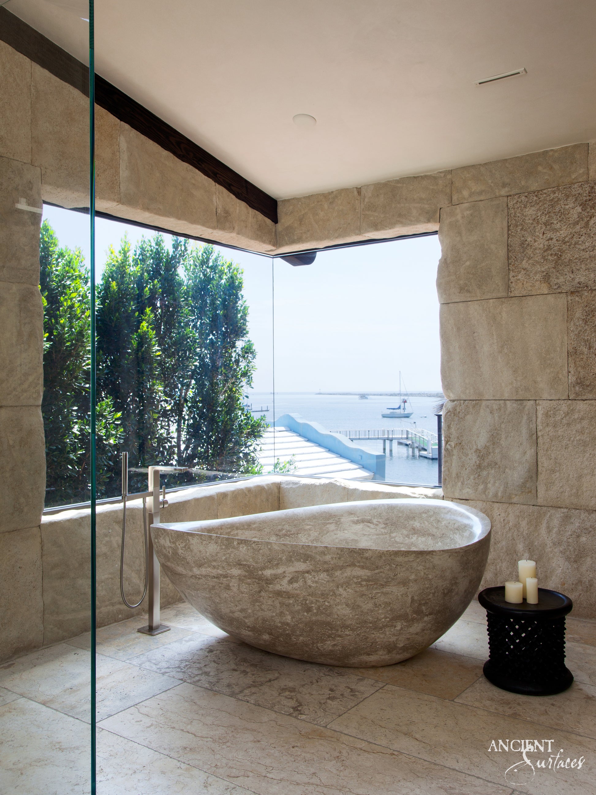 reclaimed_antique_stone_tub_marble_limestone_freestanding_bathtub_hand_carved_soaking_tub_luxury_bath_ancient_surfaces_historic_stonebath_sculpted_stone_tub_custom_carved_marble_bathtub_reclaimed_limestone_tub_old_world_bath_design_classic_european_stone_tub_high_end_bathroom_feature_luxury_interior_design_artisanal_stonework_antique_marble_tub_natural_stone_bath_vintage_stone_bathtub_master_bath_suite_ancient_surfaces_collection
