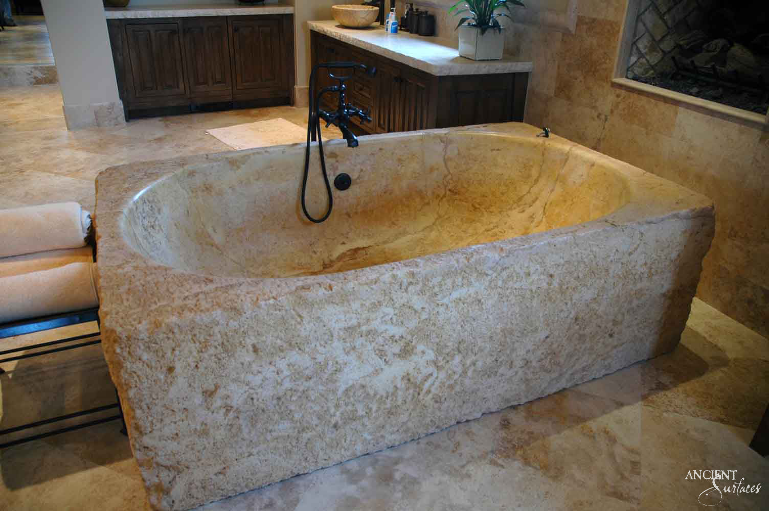 reclaimed_antique_stone_tub_marble_limestone_freestanding_bathtub_hand_carved_soaking_tub_luxury_bath_ancient_surfaces_historic_stonebath_sculpted_stone_tub_custom_carved_marble_bathtub_reclaimed_limestone_tub_old_world_bath_design_classic_european_stone_tub_high_end_bathroom_feature_luxury_interior_design_artisanal_stonework_antique_marble_tub_natural_stone_bath_vintage_stone_bathtub_master_bath_suite_ancient_surfaces_collection