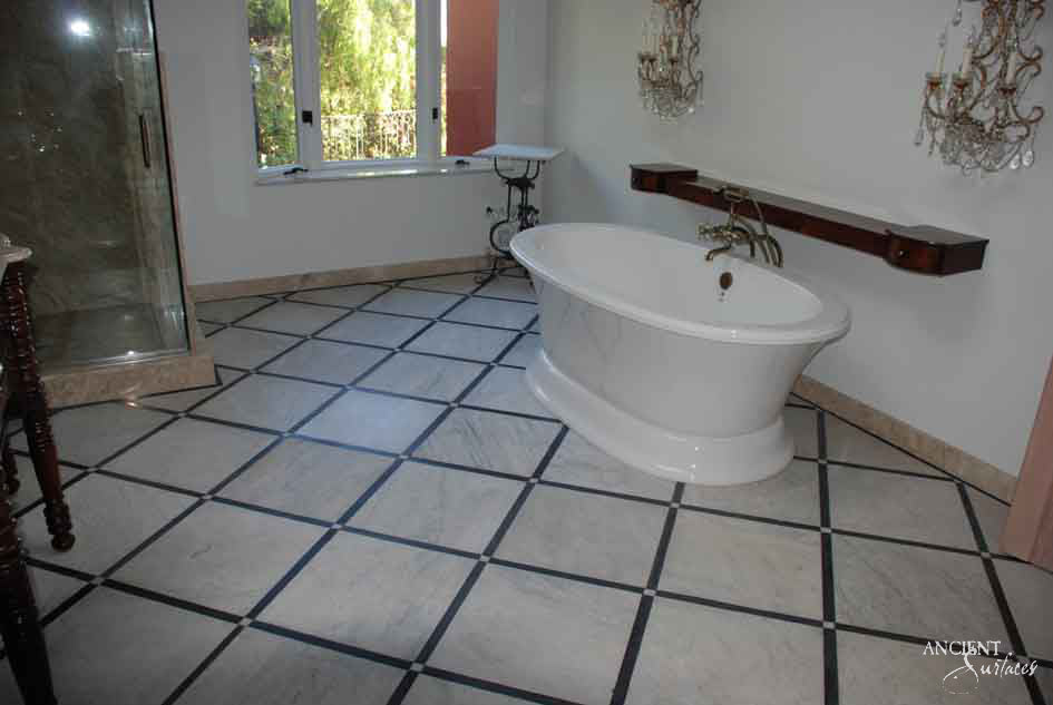 reclaimed_antique_stone_tub_marble_limestone_freestanding_bathtub_hand_carved_soaking_tub_luxury_bath_ancient_surfaces_historic_stonebath_sculpted_stone_tub_custom_carved_marble_bathtub_reclaimed_limestone_tub_old_world_bath_design_classic_european_stone_tub_high_end_bathroom_feature_luxury_interior_design_artisanal_stonework_antique_marble_tub_natural_stone_bath_vintage_stone_bathtub_master_bath_suite_ancient_surfaces_collection
